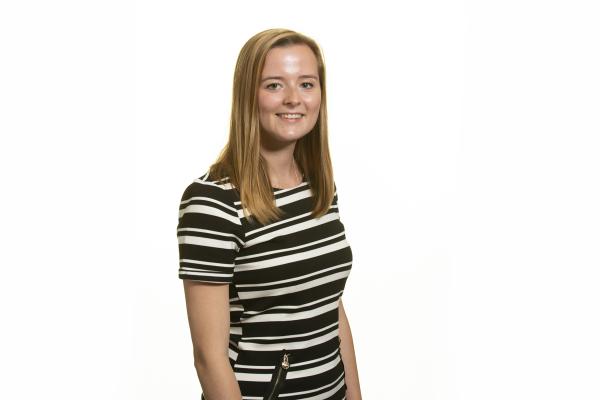 Young professional woman in stripey top